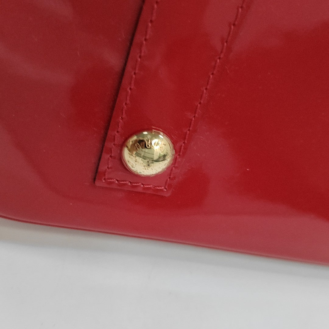 Authenticated pre-owned  Alma PM Monogram Patent Leather Red - Top Handle Bag at Looply