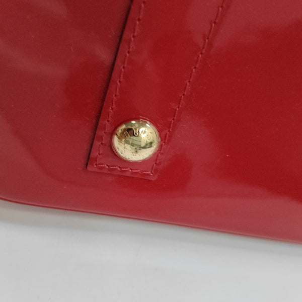 Authenticated pre-owned  Alma PM Monogram Patent Leather Red - Top Handle Bag at Looply
