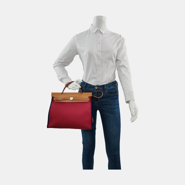 Authenticated pre-owned  Herbag 31 Canvas Red - Top Handle Bag at Looply