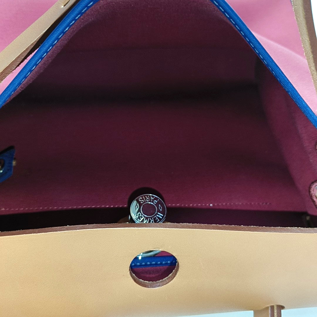 Authenticated pre-owned  Herbag 31 Canvas Red - Top Handle Bag at Looply