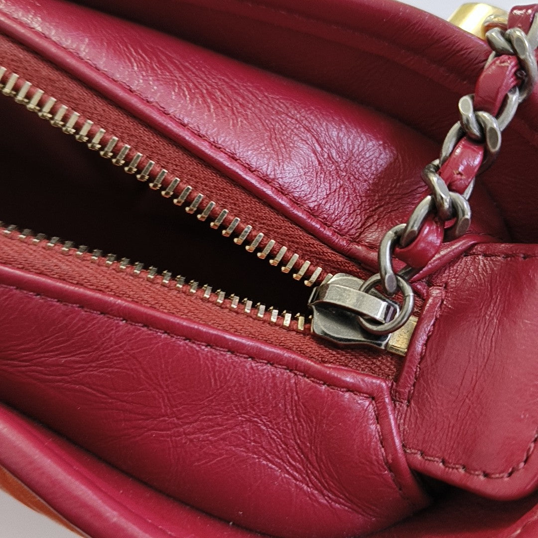 Authenticated pre-owned  Gabrielle Small Quilted Chevron Calfskin Orange - Shoulder Bag at Looply