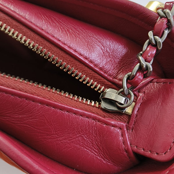 Authenticated pre-owned  Gabrielle Small Quilted Chevron Calfskin Orange - Shoulder Bag at Looply