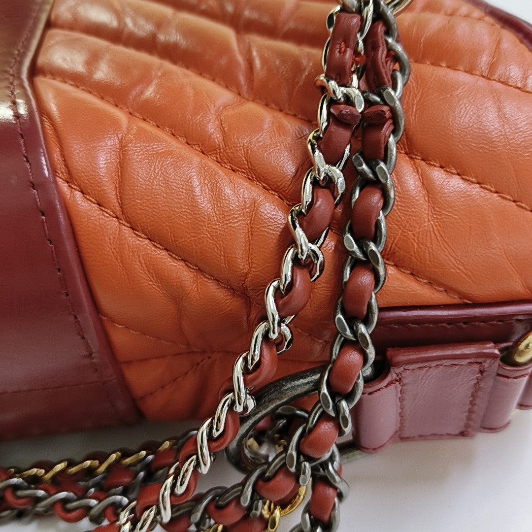 Authenticated pre-owned  Gabrielle Small Quilted Chevron Calfskin Orange - Shoulder Bag at Looply