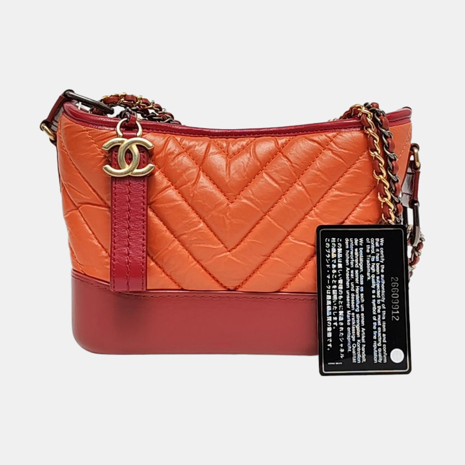 Authenticated pre-owned  Gabrielle Small Quilted Chevron Calfskin Orange - Shoulder Bag at Looply