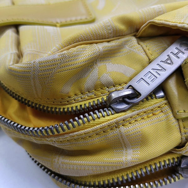 Authenticated pre-owned  Chanel Travel Line Fabric Yellow - Shoulder Bag at Looply
