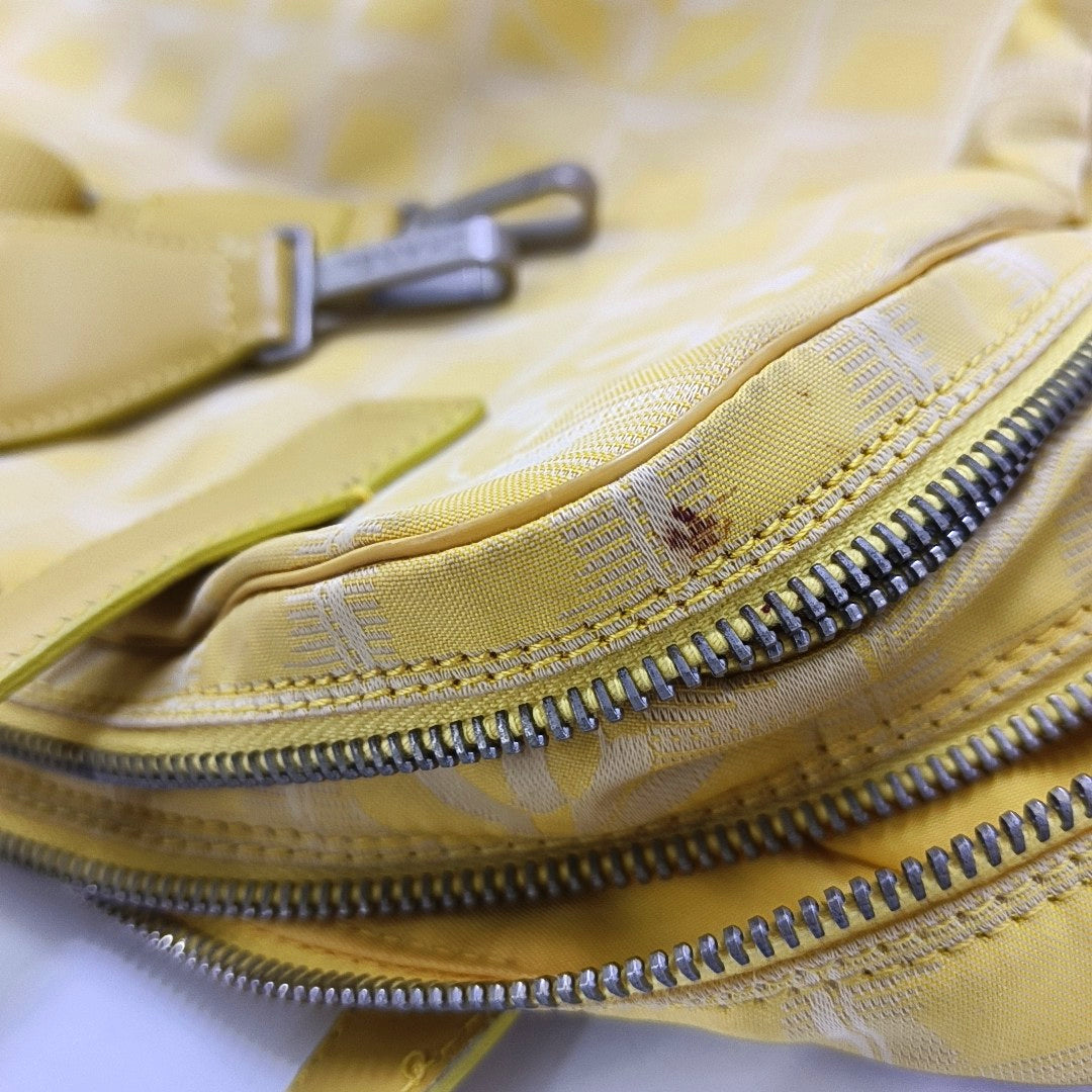 Authenticated pre-owned  Chanel Travel Line Fabric Yellow - Shoulder Bag at Looply