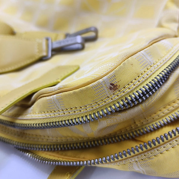 Authenticated pre-owned  Chanel Travel Line Fabric Yellow - Shoulder Bag at Looply