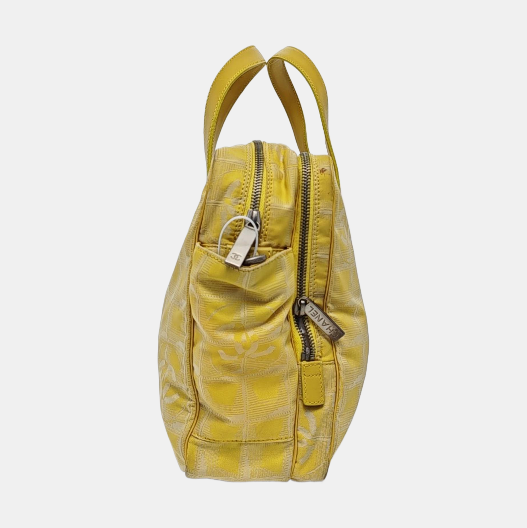 Authenticated pre-owned  Chanel Travel Line Fabric Yellow - Shoulder Bag at Looply
