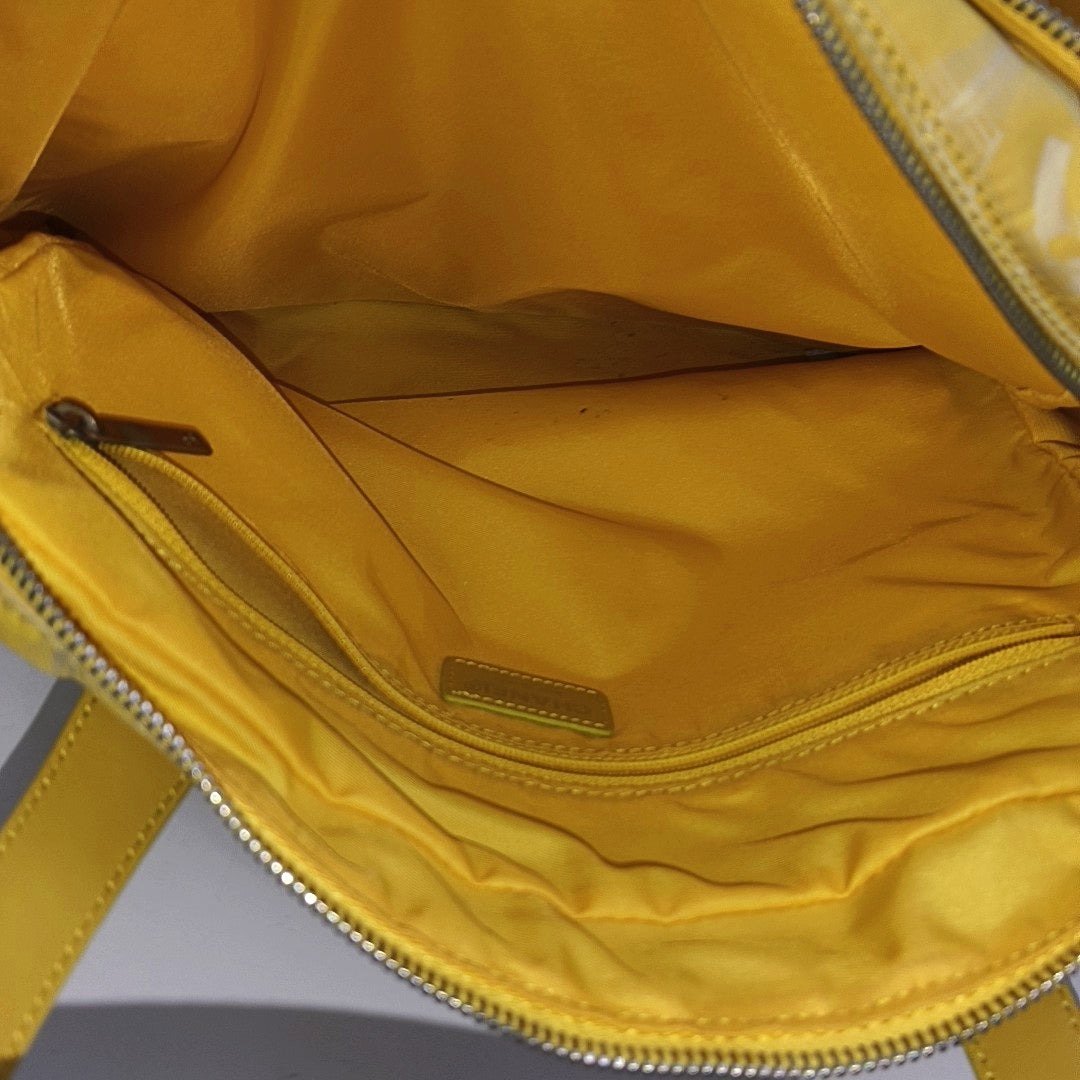 Authenticated pre-owned  Chanel Travel Line Fabric Yellow - Shoulder Bag at Looply