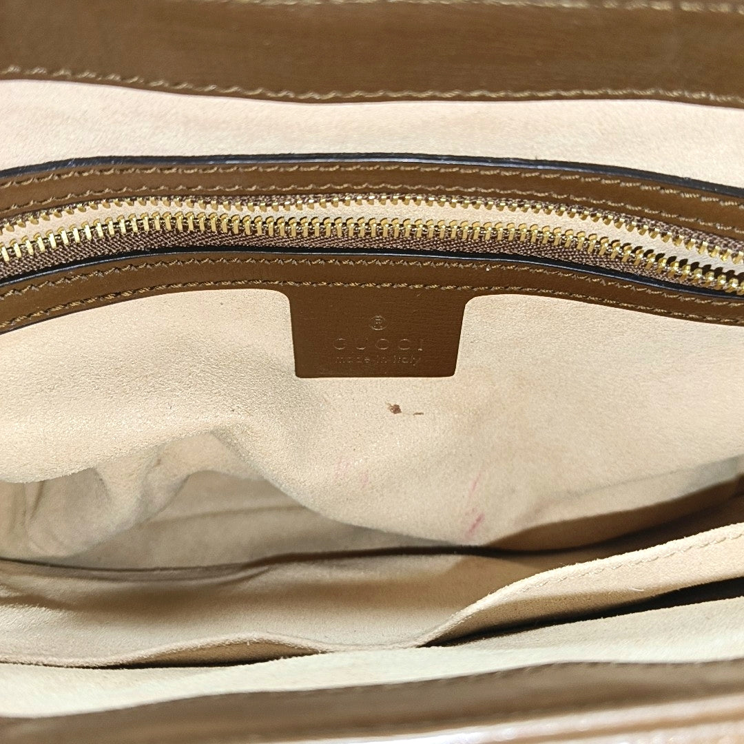 Authenticated pre-owned  Jackie 1961 Small Monogram Coated Canvas Beige - Top Handle Bag at Looply