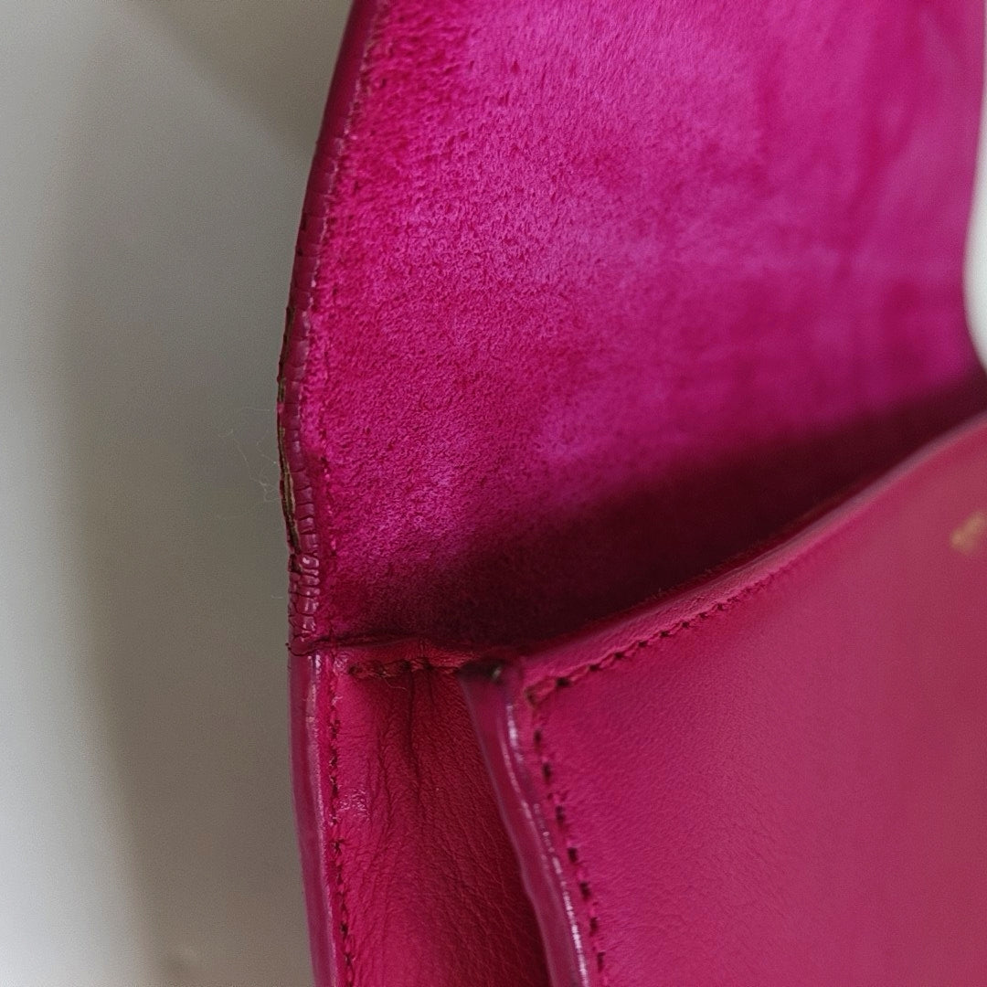 Authenticated pre-owned  Saint Laurent Chyc Y Ligne Calfskin Pink - Clutch at Looply