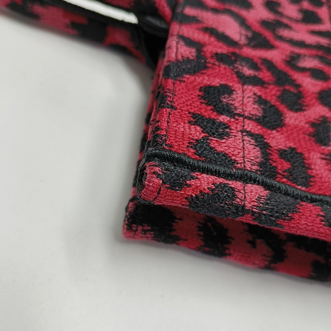Authenticated pre-owned  Book Tote Medium Fabric Red - Top Handle Bag at Looply