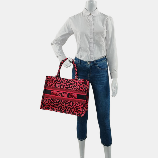 Authenticated pre-owned  Book Tote Medium Fabric Red - Top Handle Bag at Looply
