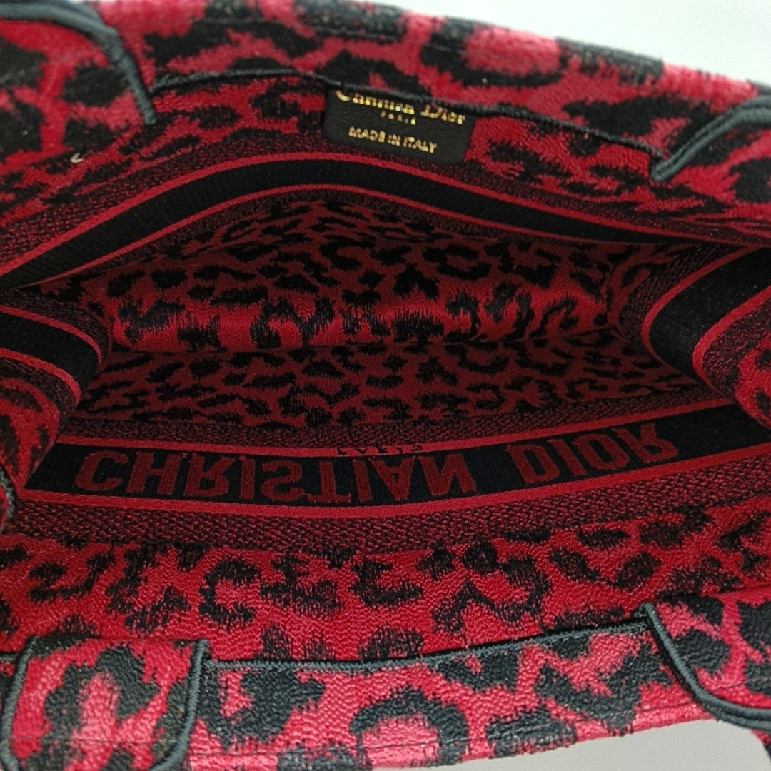 Authenticated pre-owned  Book Tote Medium Fabric Red - Top Handle Bag at Looply