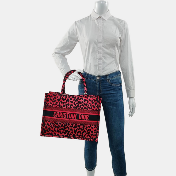 Authenticated pre-owned  Book Tote Medium Fabric Red - Top Handle Bag at Looply