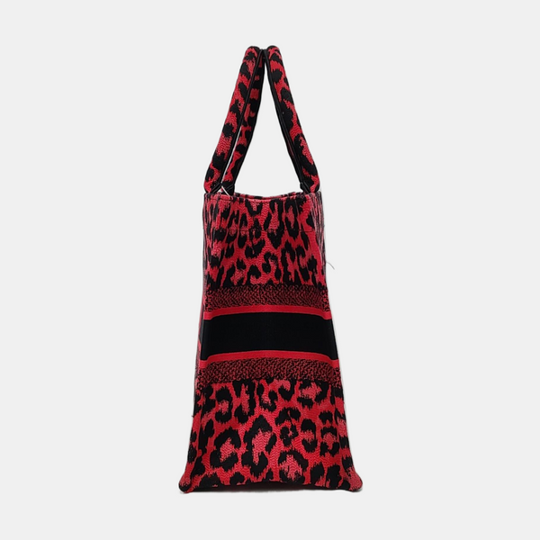 Authenticated pre-owned  Book Tote Medium Fabric Red - Top Handle Bag at Looply