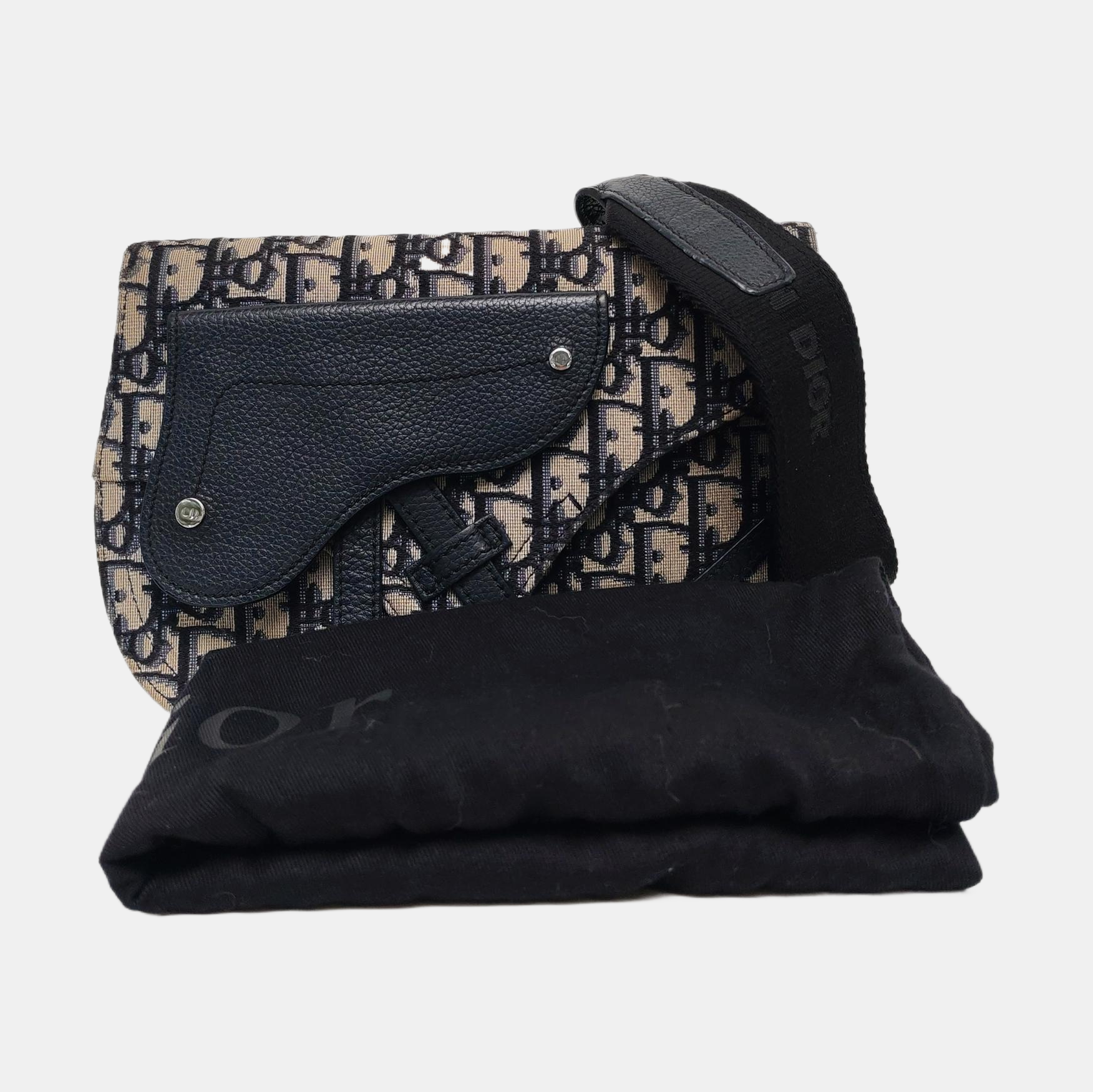 Authenticated pre-owned  Saddle Monogram Canvas Beige - Crossbody Bag at Looply