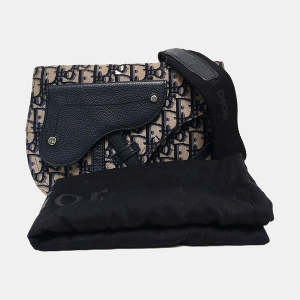 Authenticated pre-owned  Saddle Monogram Canvas Beige - Crossbody Bag at Looply