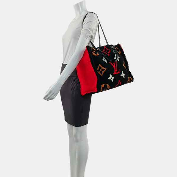 Authenticated pre-owned  Onthego GM Monogram Wool Black - Shoulder Bag at Looply