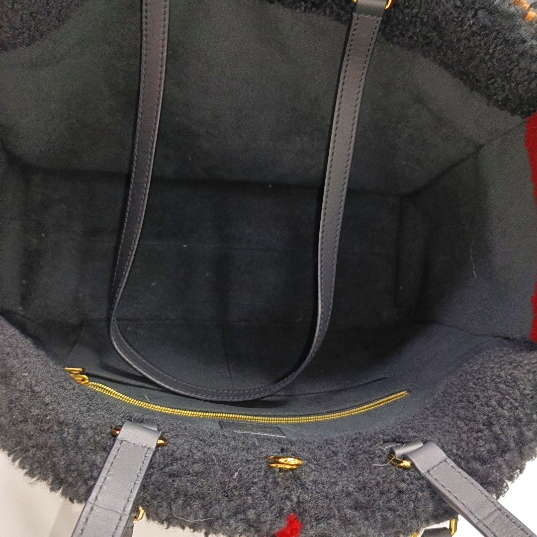 Authenticated pre-owned  Onthego GM Monogram Wool Black - Shoulder Bag at Looply