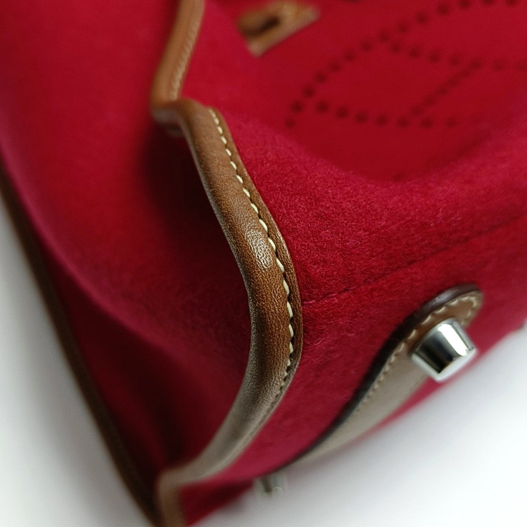 Authenticated pre-owned  Evelyne 38 Felt Red - Top Handle Bag at Looply