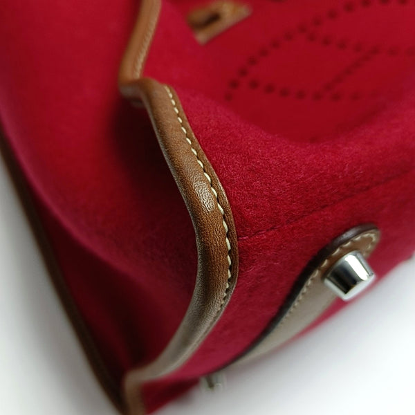 Authenticated pre-owned  Evelyne 38 Felt Red - Top Handle Bag at Looply