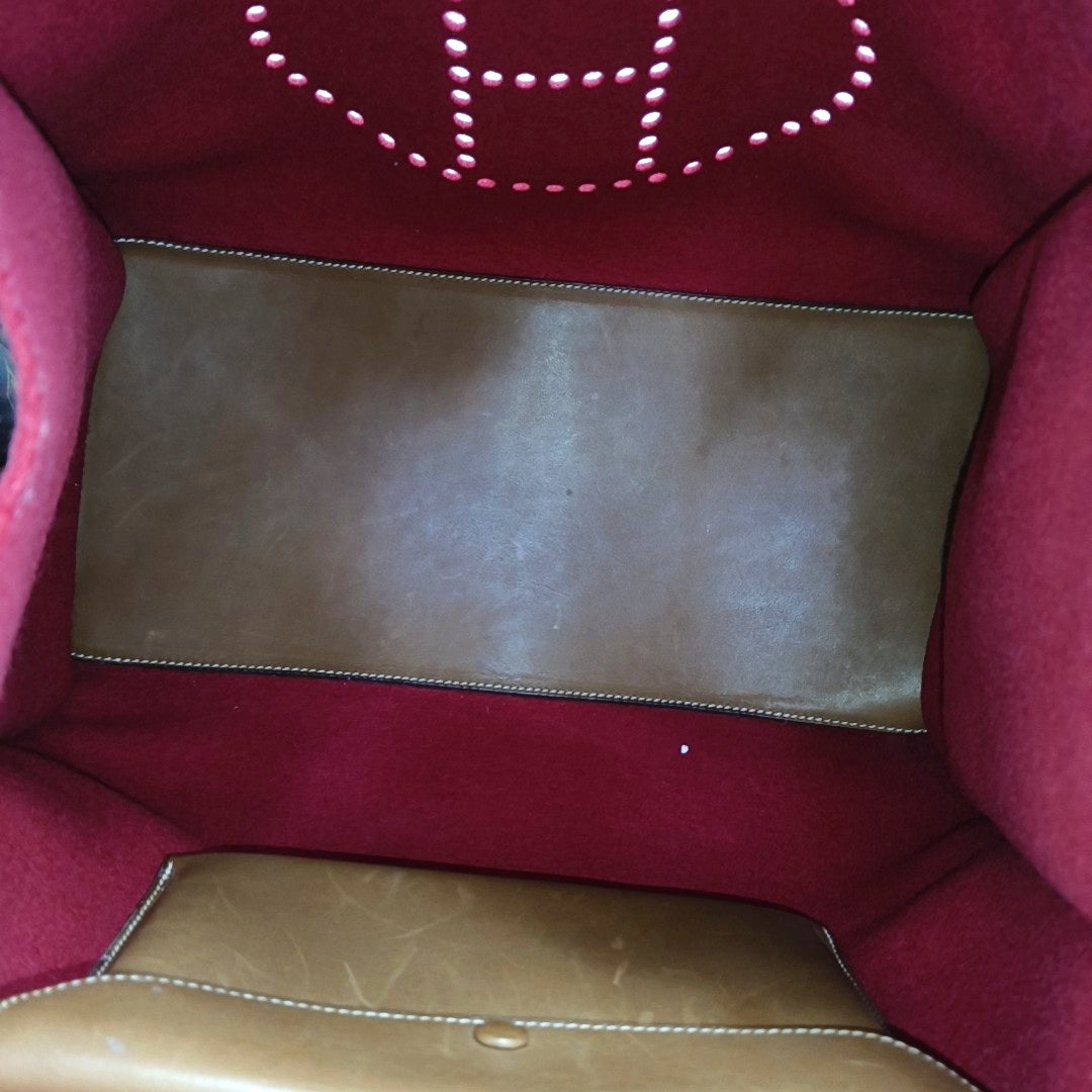 Authenticated pre-owned  Evelyne 38 Felt Red - Top Handle Bag at Looply