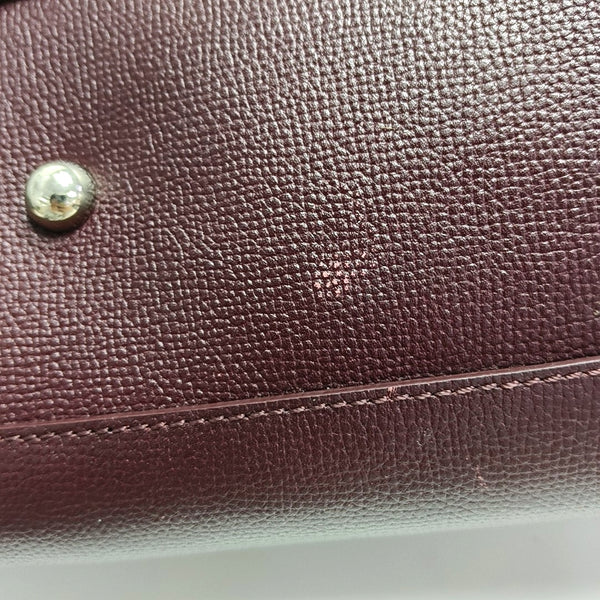 Authenticated pre-owned  The Banner Medium Calfskin Burgundy - Top Handle Bag at Looply
