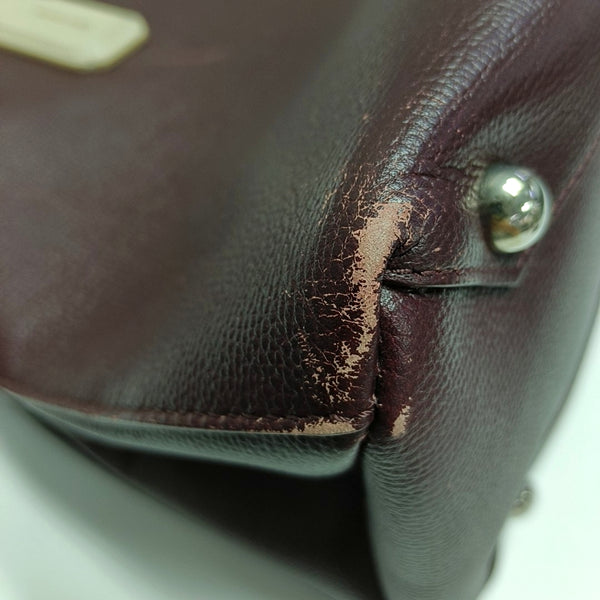 Authenticated pre-owned  The Banner Medium Calfskin Burgundy - Top Handle Bag at Looply