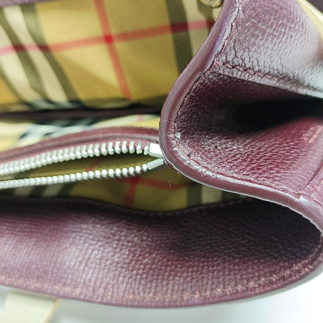 Authenticated pre-owned  The Banner Medium Calfskin Burgundy - Top Handle Bag at Looply