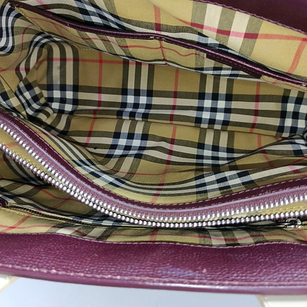 Authenticated pre-owned  The Banner Medium Calfskin Burgundy - Top Handle Bag at Looply
