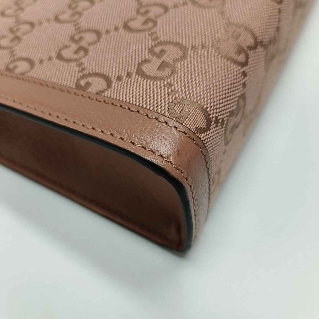 Authenticated pre-owned  Ophidia Monogram Canvas Pink - Clutch at Looply