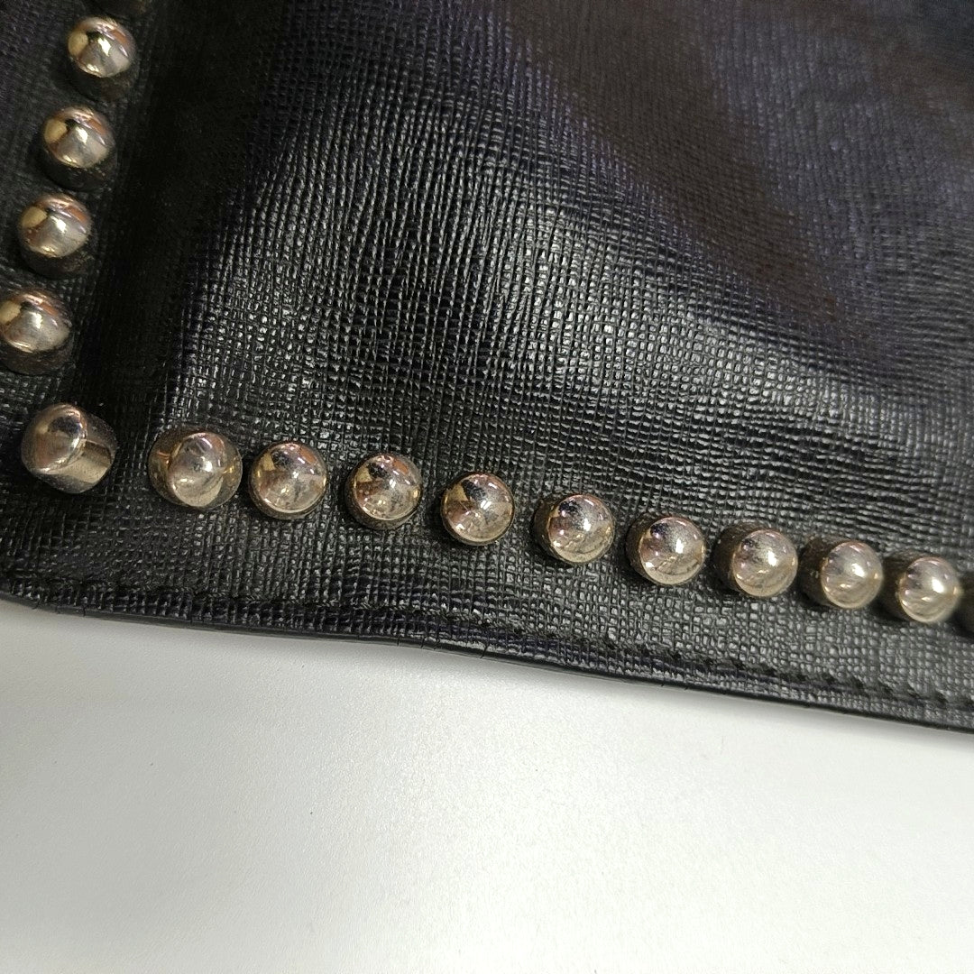 Authenticated pre-owned  Karlito Calfskin Black - Clutch at Looply