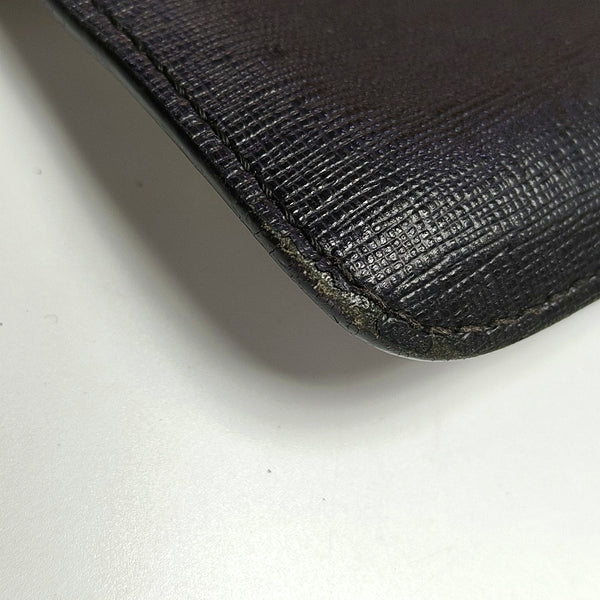 Authenticated pre-owned  Karlito Calfskin Black - Clutch at Looply