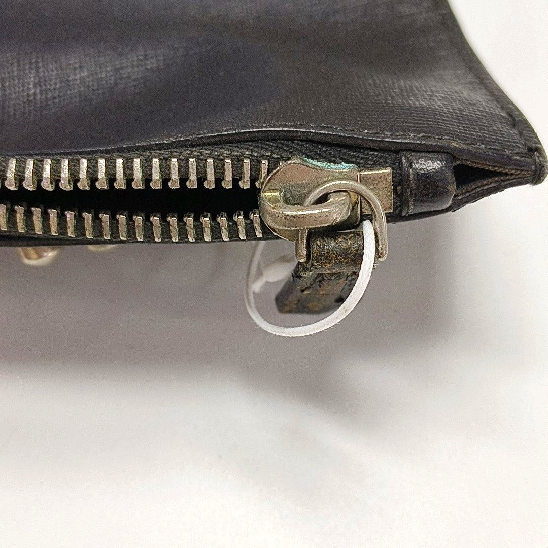 Authenticated pre-owned  Karlito Calfskin Black - Clutch at Looply