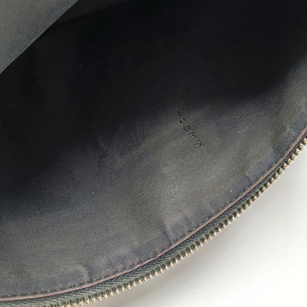 Authenticated pre-owned  Karlito Calfskin Black - Clutch at Looply