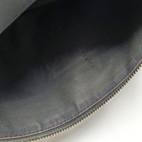 Authenticated pre-owned  Karlito Calfskin Black - Clutch at Looply