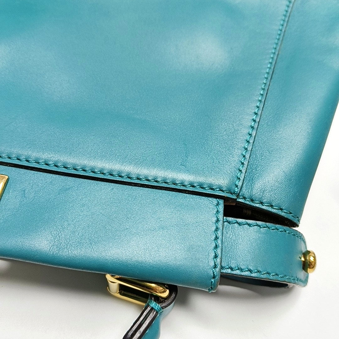 Authenticated pre-owned  Peekaboo Medium Calfskin Green - Top Handle Bag at Looply