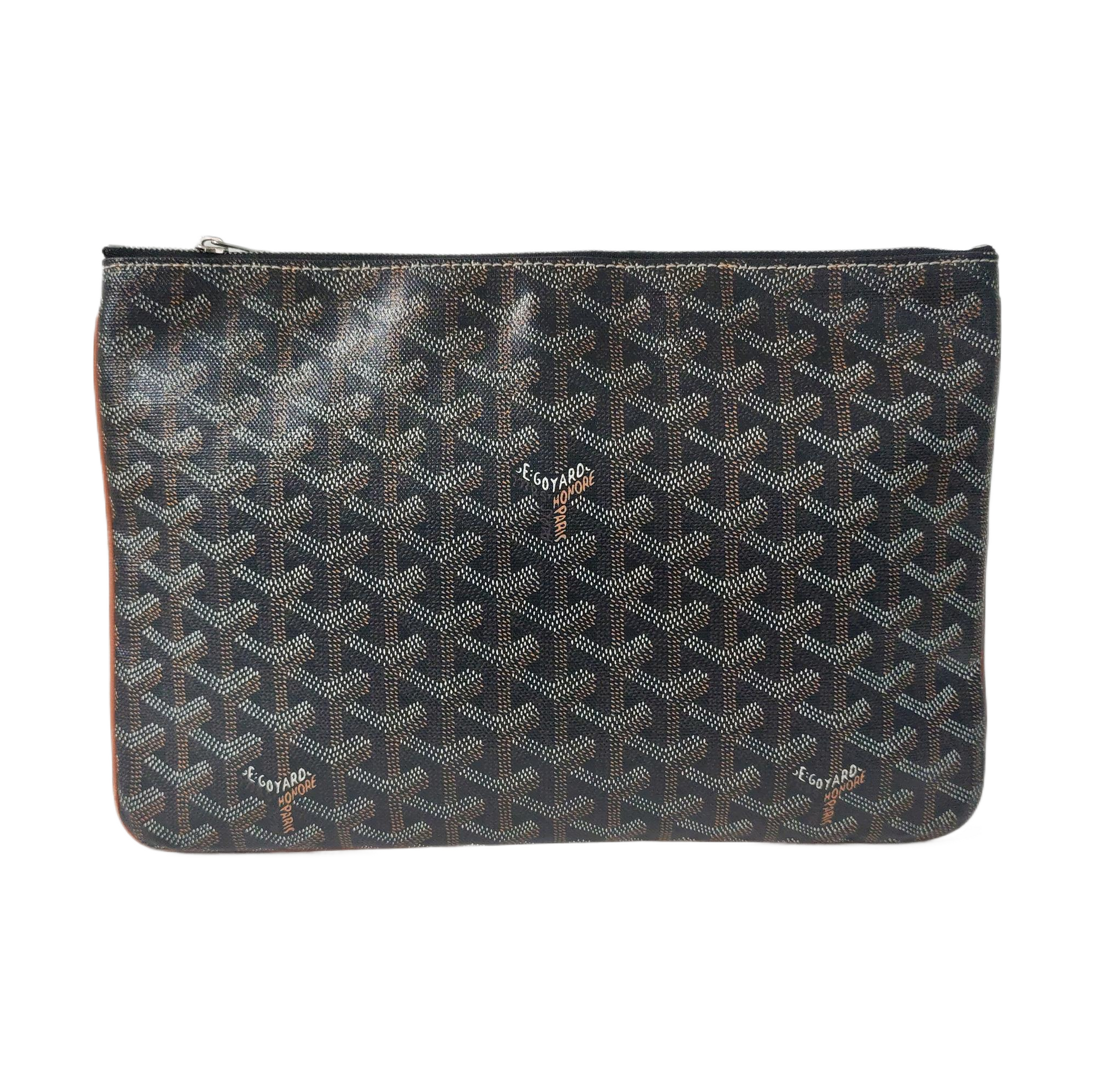 Authenticated pre-owned  Sénat Coated Canvas Black - Clutch at Looply