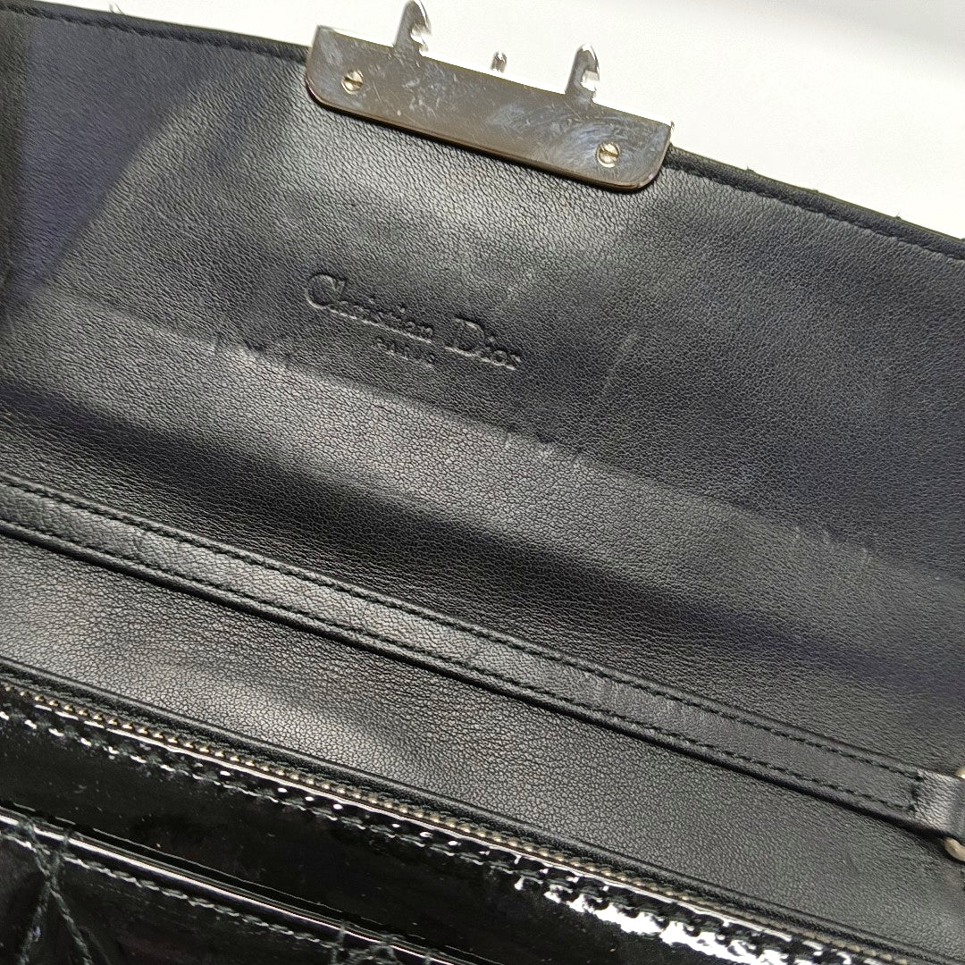 Authenticated pre-owned  Miss Dior Quilted Damier Patent Leather Black - Top Handle Bag at Looply