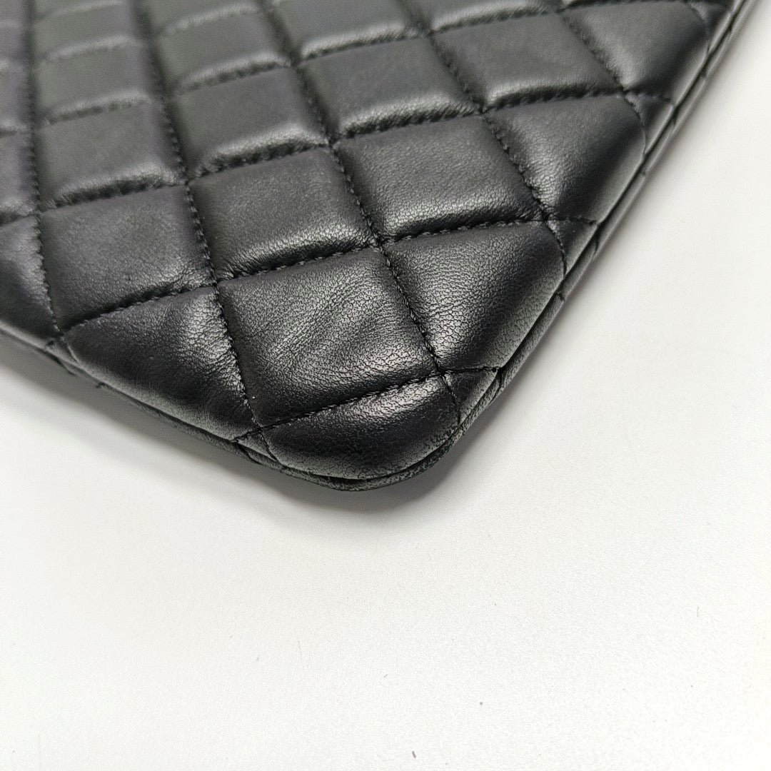 Authenticated pre-owned  Boy Chanel Large Quilted Lambskin Black - Clutch at Looply