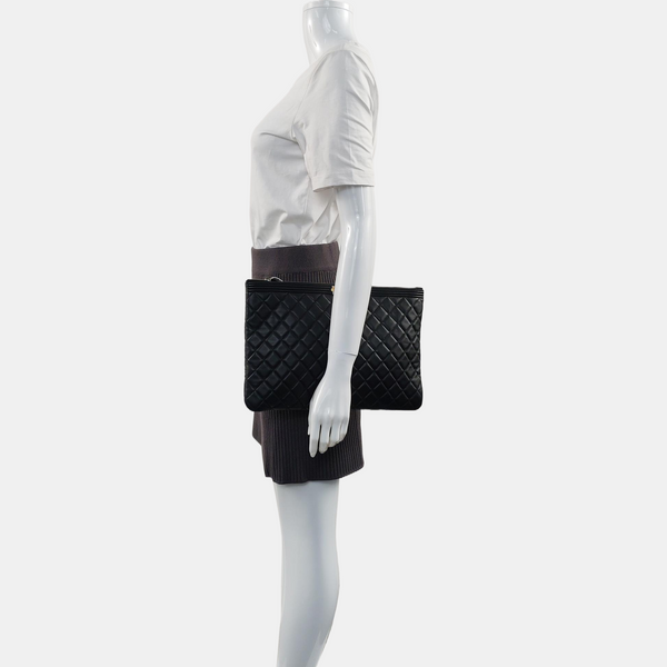 Authenticated pre-owned  Boy Chanel Large Quilted Lambskin Black - Clutch at Looply