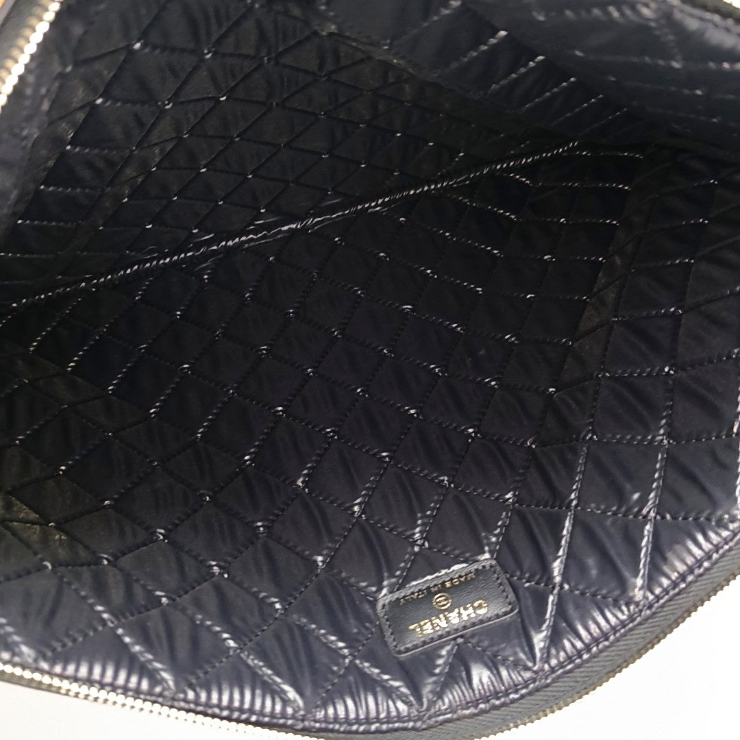 Authenticated pre-owned  Boy Chanel Large Quilted Lambskin Black - Clutch at Looply