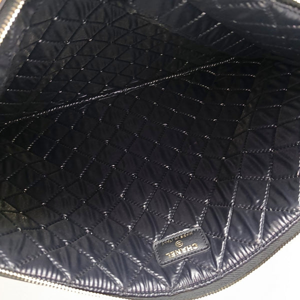 Authenticated pre-owned  Boy Chanel Large Quilted Lambskin Black - Clutch at Looply