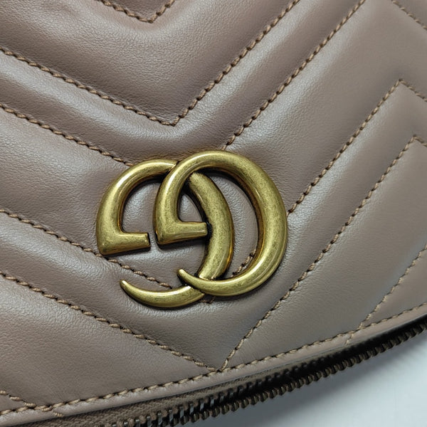 Authenticated pre-owned  GG Marmont Quilted Calfskin Beige - Clutch at Looply