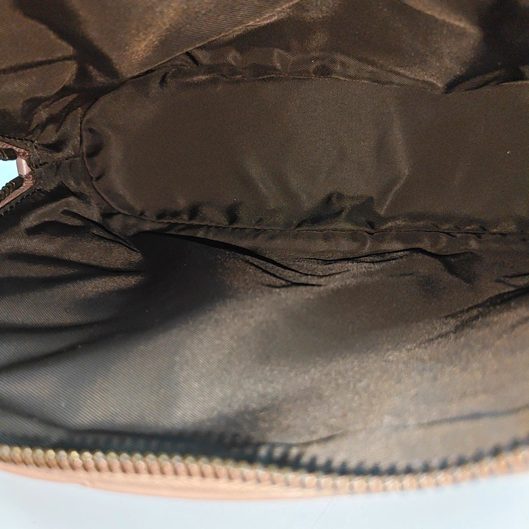 Authenticated pre-owned  GG Marmont Quilted Calfskin Beige - Clutch at Looply