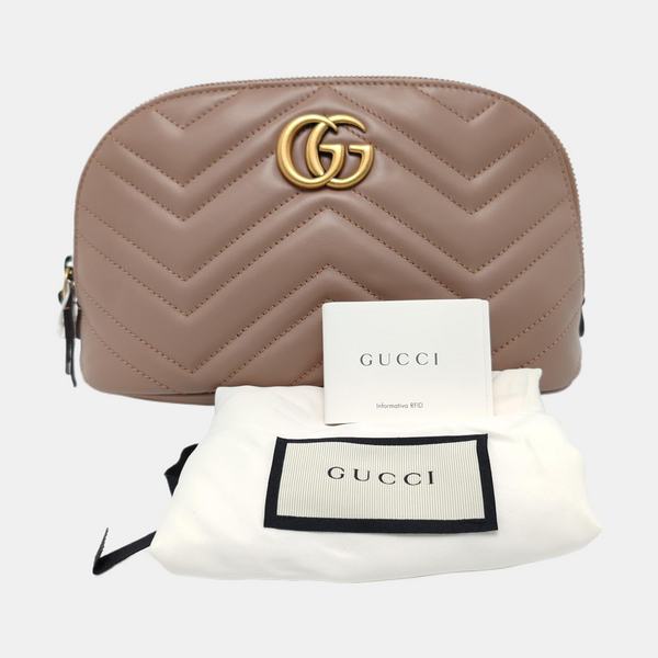 Authenticated pre-owned  GG Marmont Quilted Calfskin Beige - Clutch at Looply