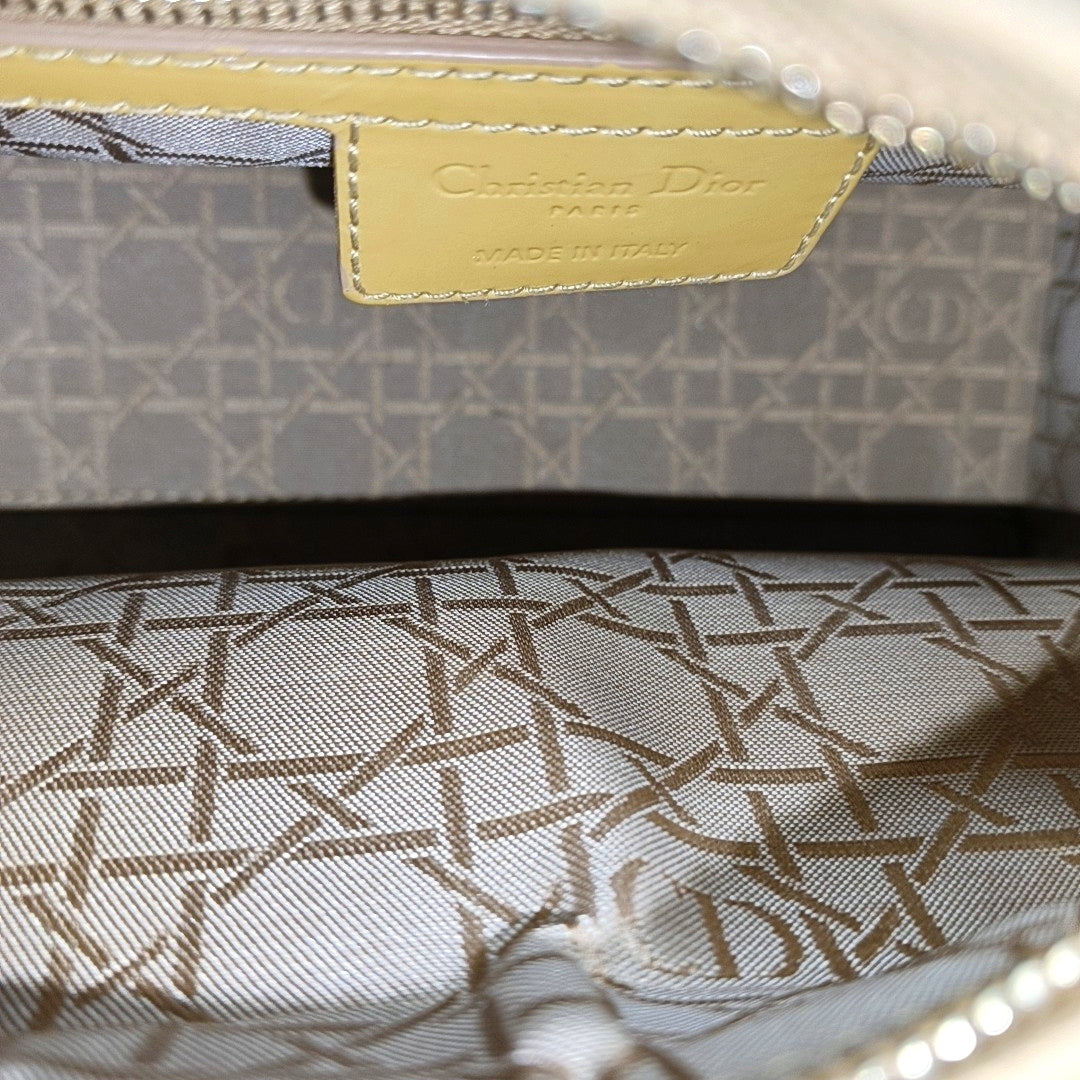 Authenticated pre-owned  Lady Dior Cannage Patent Leather Yellow - Shoulder Bag at Looply