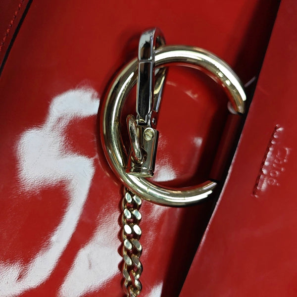 Authenticated pre-owned  Faye Medium Patent Leather Red - Top Handle Bag at Looply
