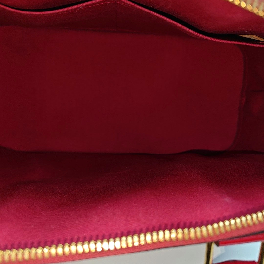 Authenticated pre-owned  Alma PM Monogram Patent Leather Red - Top Handle Bag at Looply